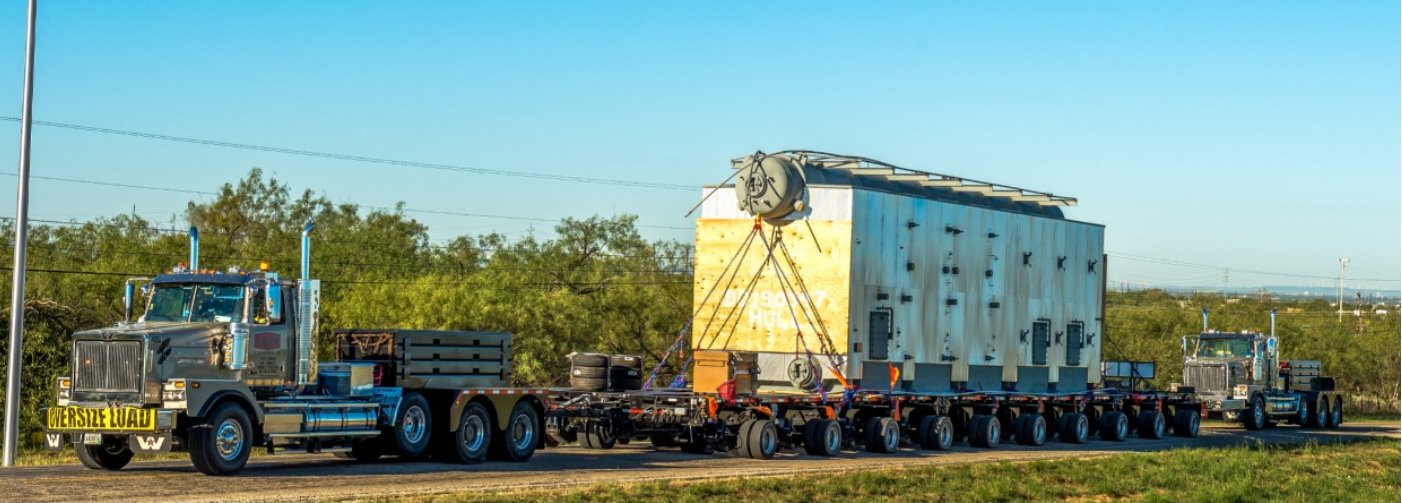 Heavy haul shipping flatbed trailers from Parish Transport on the road