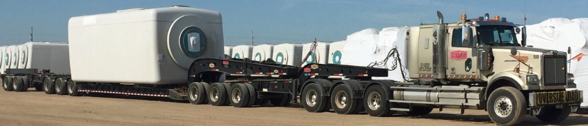 Heavy haul shipping flatbed trailers from Parish Transport on the road