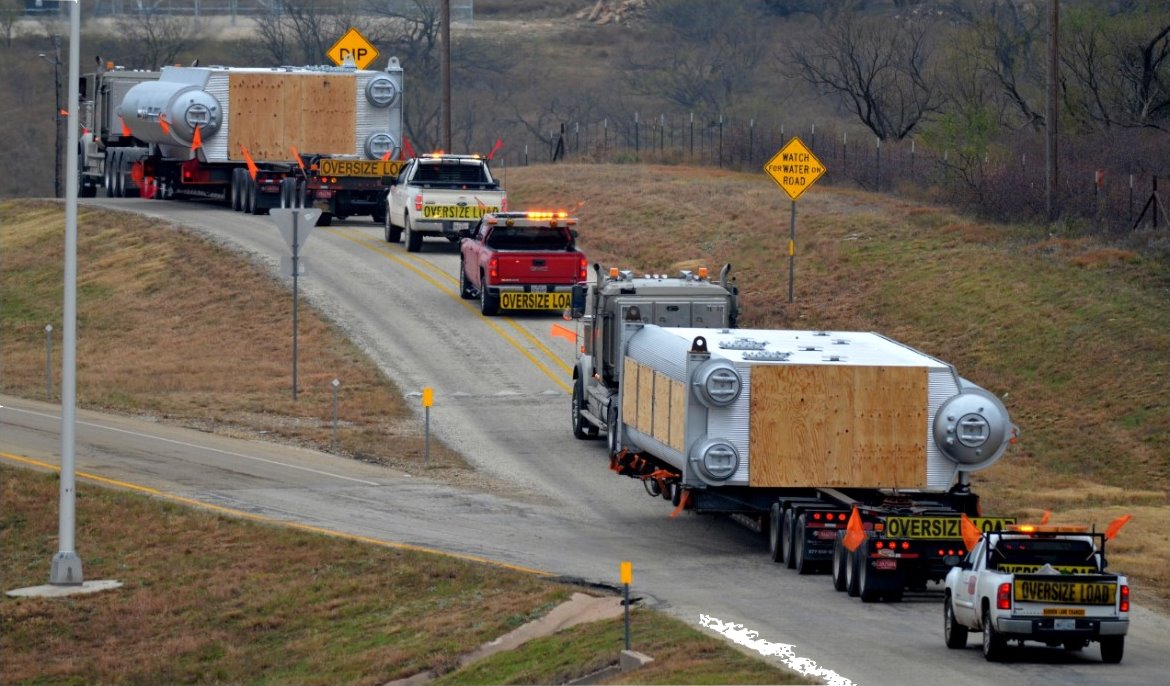 Heavy haul shipping flatbed trailers from Parish Transport on the road