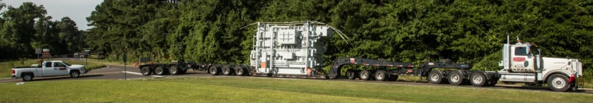 Heavy haul shipping flatbed trailers from Parish Transport on the road