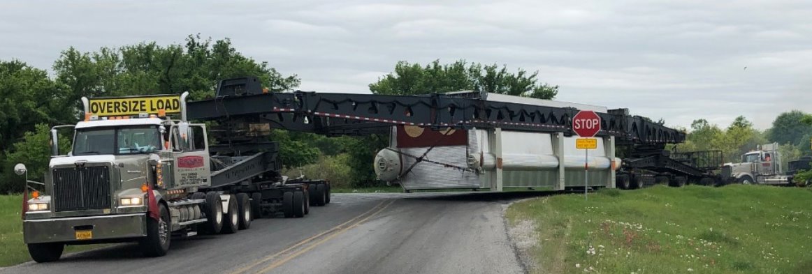 Heavy haul shipping flatbed trailers from Parish Transport on the road