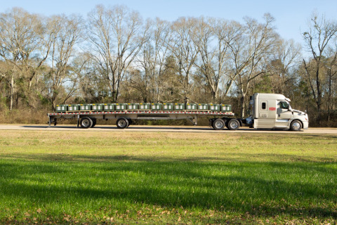 A Parish Transport flatbed trailer moves smaller items